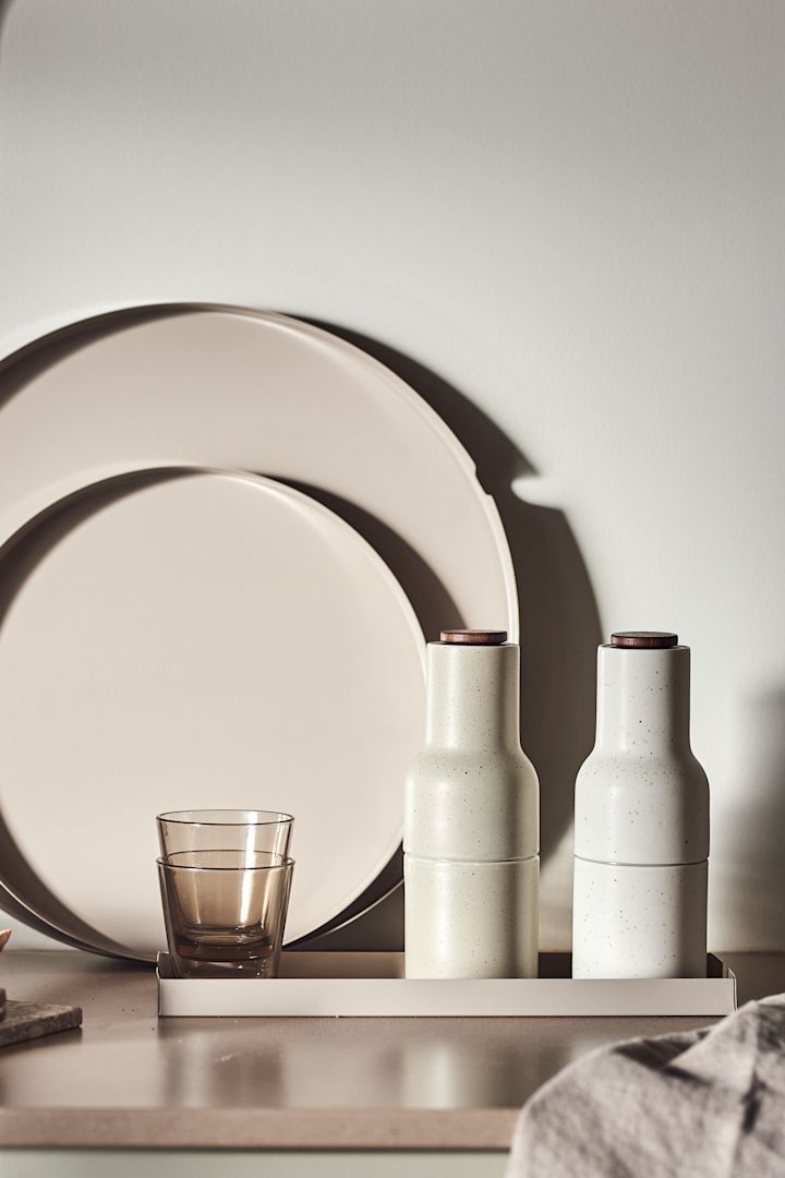 Organising the home is one of the interior design trends for spring 2023, where Scandi Living's trays and spice grinders from Menu are perfect when you need to organise the kitchen neatly.