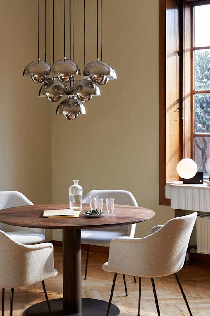 For autumn 2023 interior design trends, choose lamps with a chrome finish - like this beautiful VP1 Flowerpot pendant from &Tradition. 