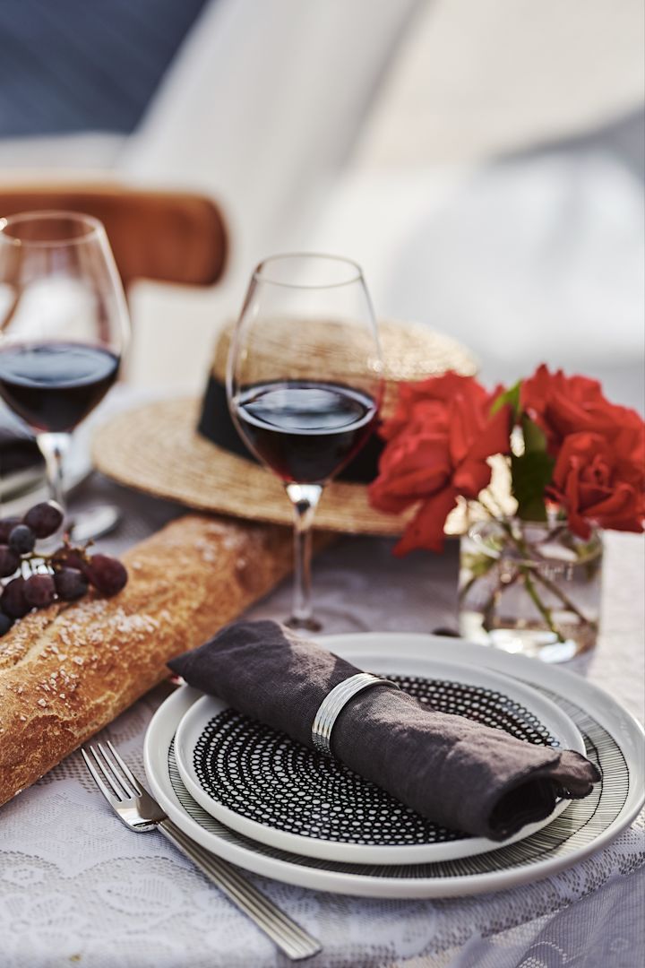 A Romantic table setting for Valentine's Day with Marimekko plates and Georg Jensen cutlery.