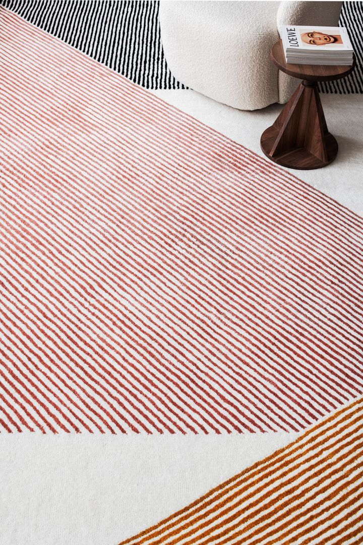 NJRD carpet rectangles in pink, white and orange.