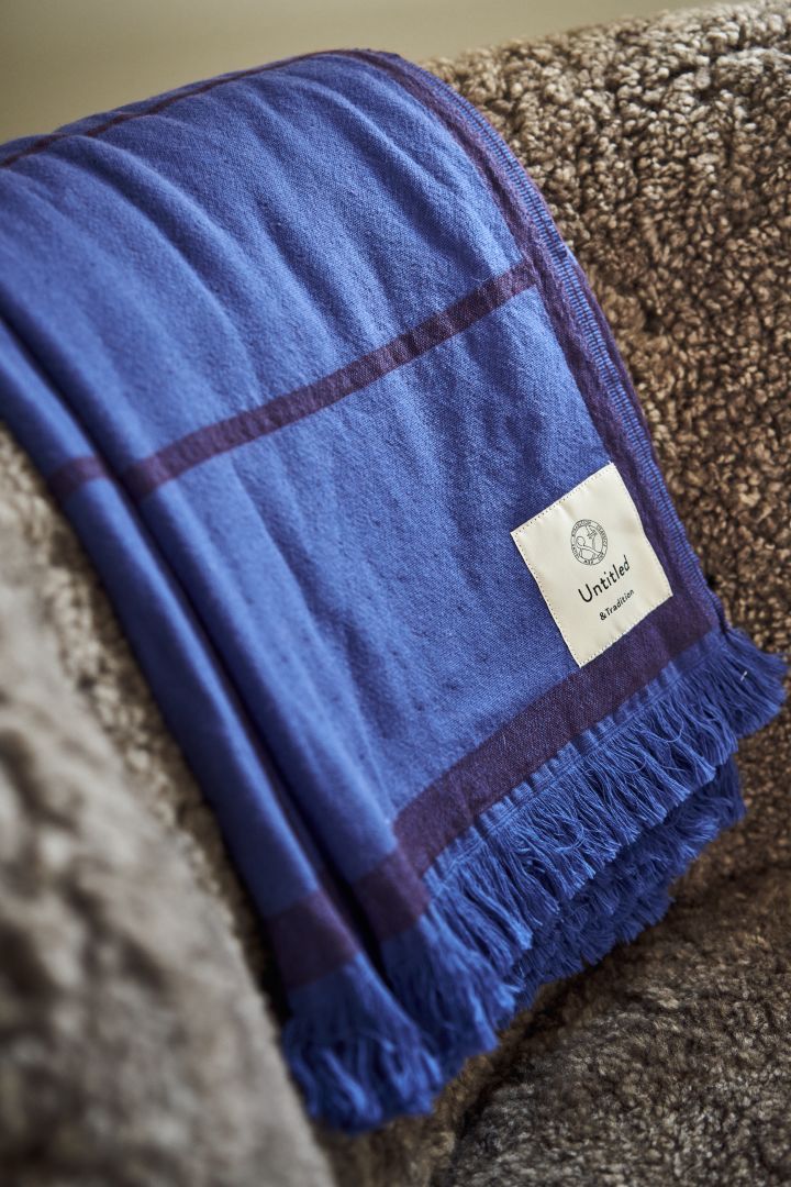 Cobalt blue is the it colour among the interior design trends for autumn 2022 seen here in the Untitled AP10 throw from &Tradition.