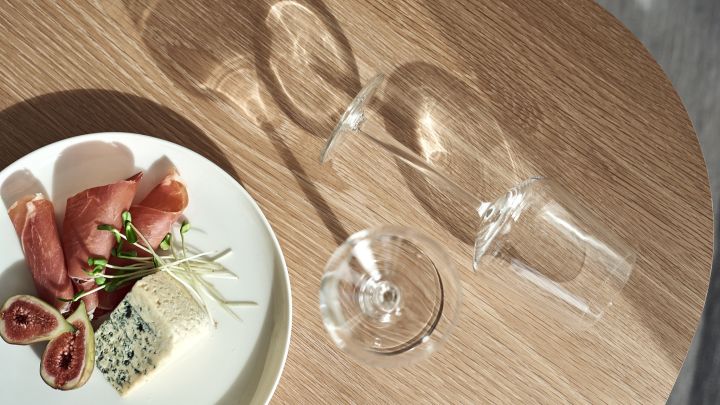Iittala's Essence series, here with red wine glass and plate, is one of the brand's most popular series.