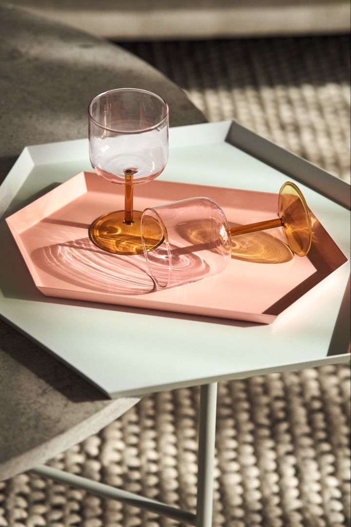 The best selling Kaleido tray from HAY in white and pink with the Tint wine glasses in pink and yellow. 