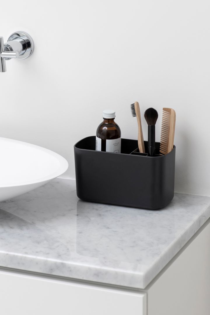 Storage ideas for small bathrooms - here you see the Brabantia sink organiser used to hold toothbrushes and other bathroom essentials. 