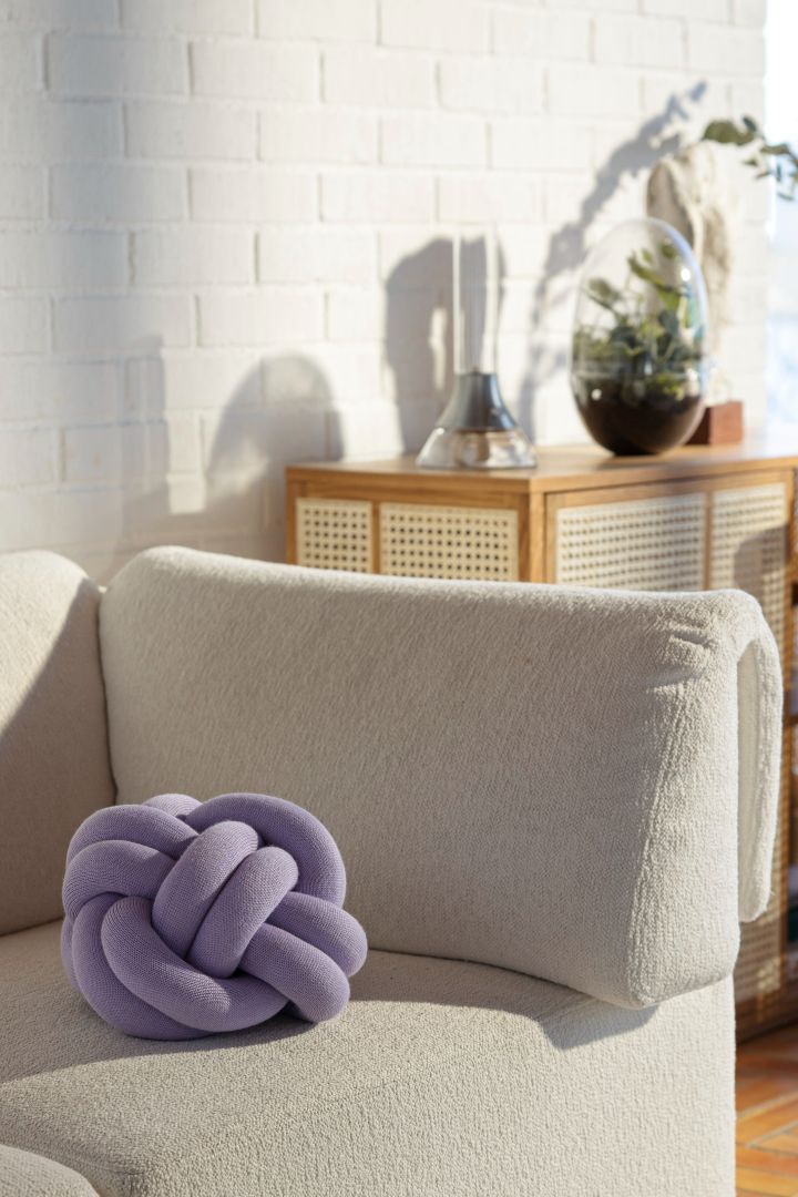 The year's interior colour trends for 2024 still include shades of lilac like this Knot pillow from Design House Stockholm. 