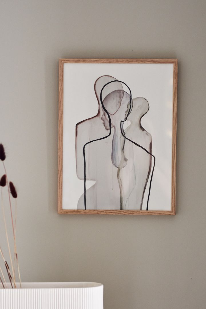 17 stylish Scandinavian wall posters to give your walls an update - here you see graphic Mother poster from Paper Collective in tones of white and beige.