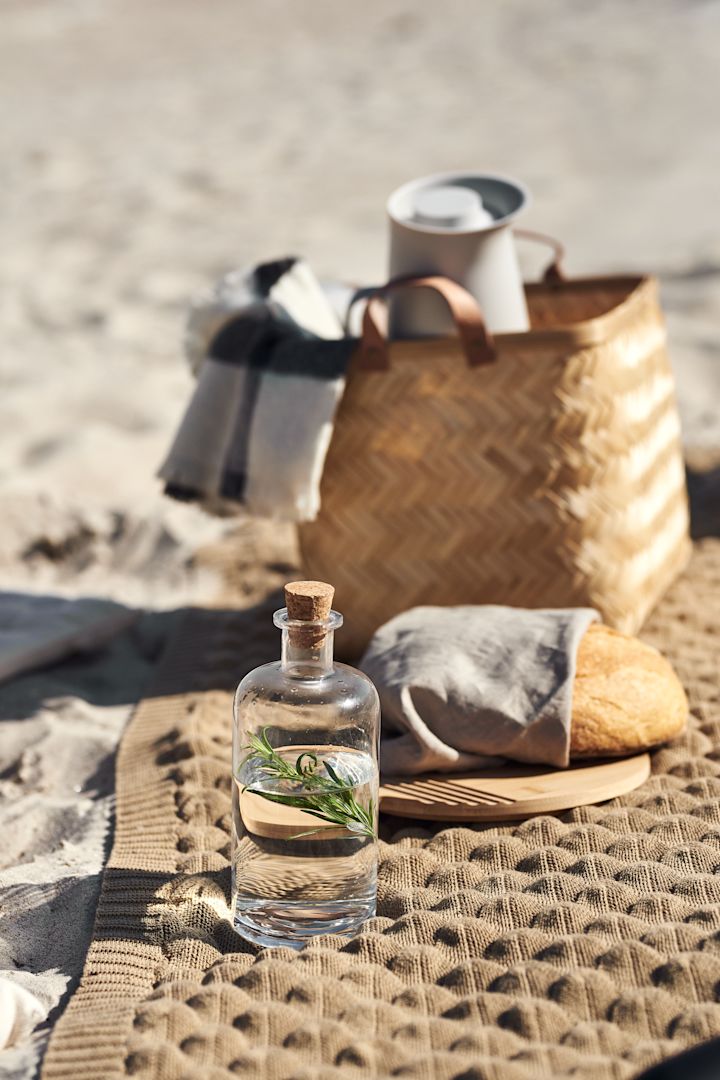A cosy picnic blanket is a real summer essential. Seen here is the Gems throw for Classic Collection, perfect for a picnic on the beach. 