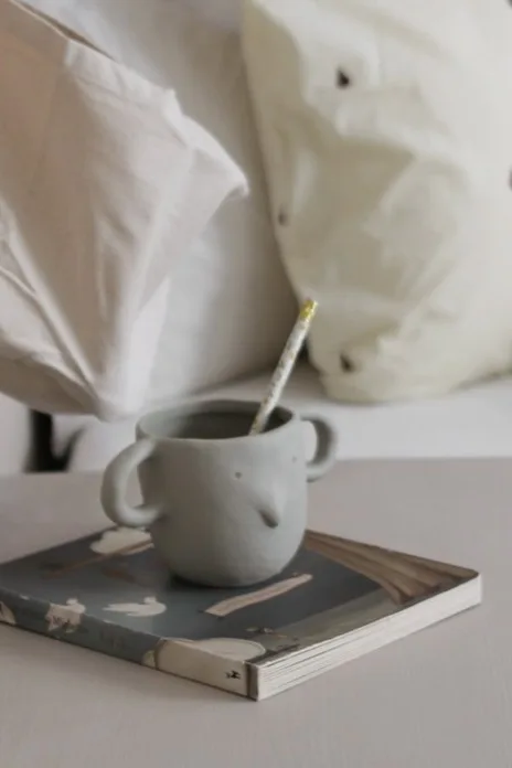 Practical and cute accessories for your children's room add a sense of fun like this mug with a face from ferm LIVING.