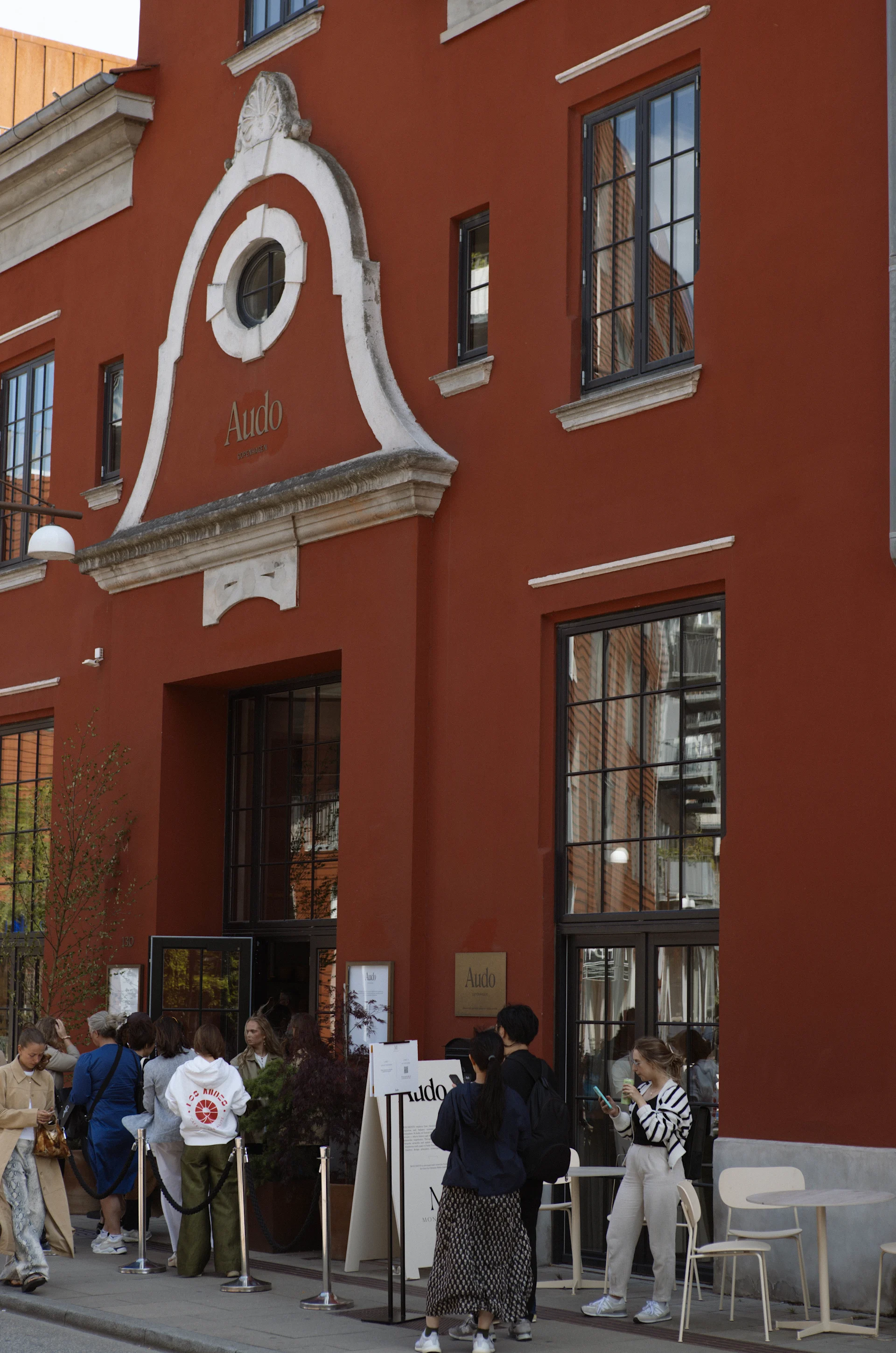 The red building, The Audo, from Audo Copenhagen, which houses a showroom, hotel, café and restaurant.
