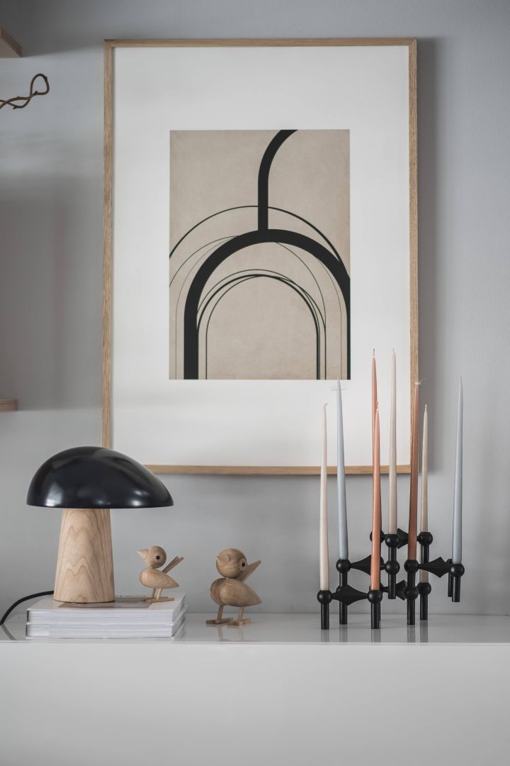 Here you see the Scandinavian design lamp Night Owl from Fritz Hansen in midnight blue and ash wood. 