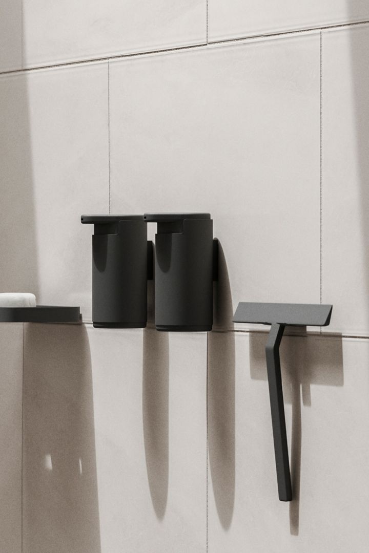 Storage ideas for small bathrooms - Here you see the Zone Denmark wall mounted soap dispensers in black. 