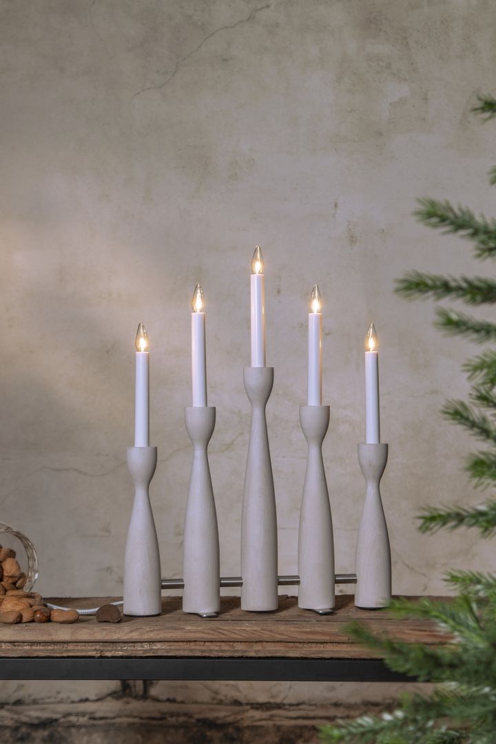 Stylish Christmas candle bridges to light up your windowsill this Christmas. Here you see the Midja candle arch from Star Trading.  
