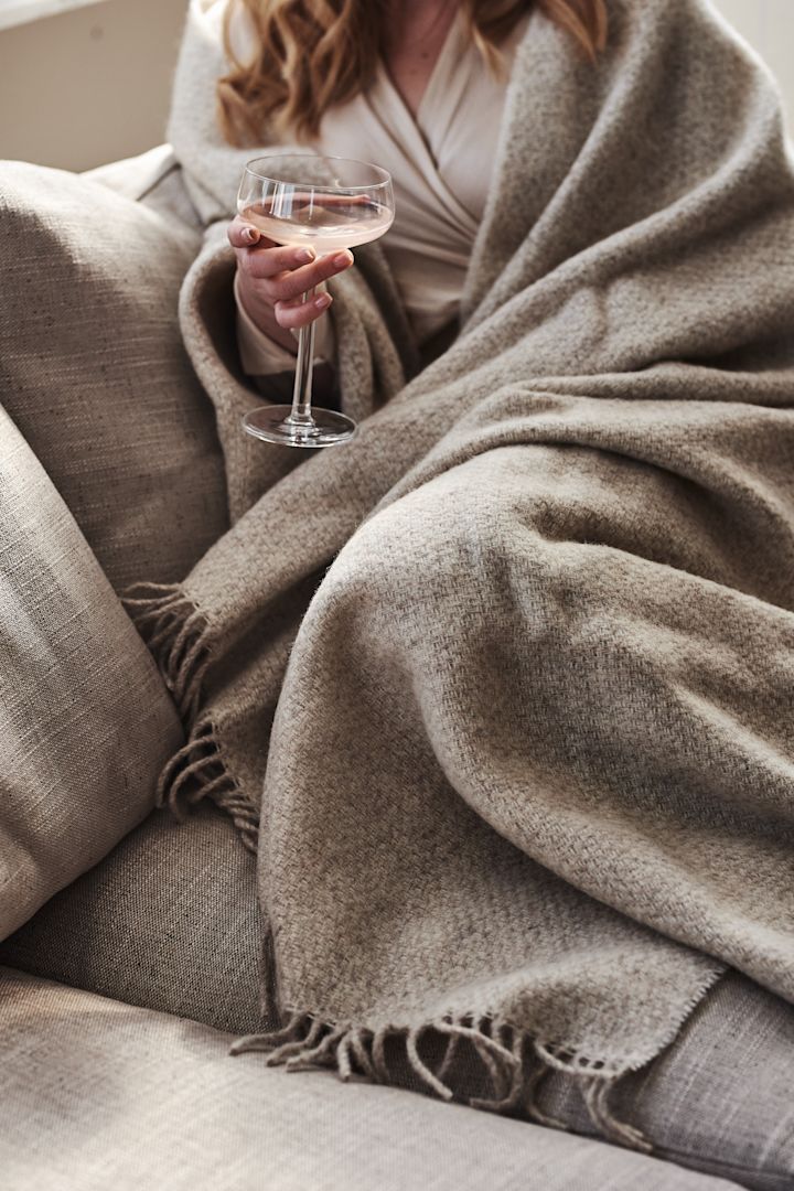 A luxurious wool thrown such as this Sandstone throw from Scandi Living makes the ideal anniversary gift idea for couples who like cosy interior design. 