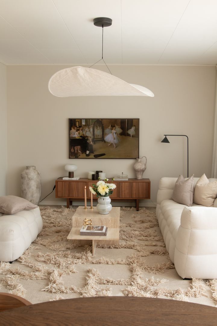 Create a cosy hygge living room with like the one here from Instagram profile @joanna.avento with calming beige tones. 