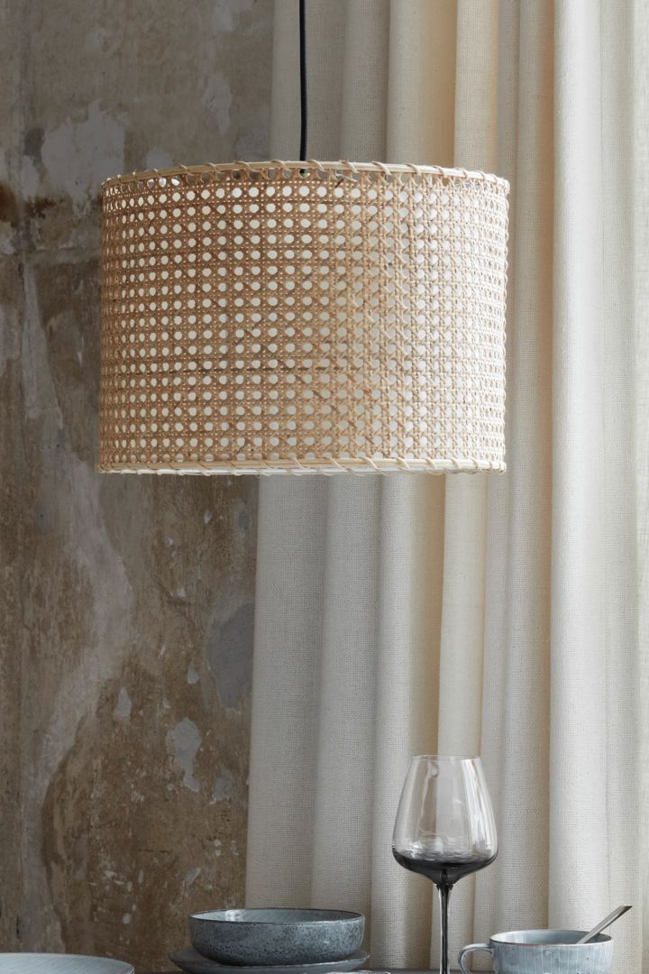 Rattan and jute are two of the autumn interior design trends 2021 - here is the Ruben lamp in rattan from Broste Copenhagen.