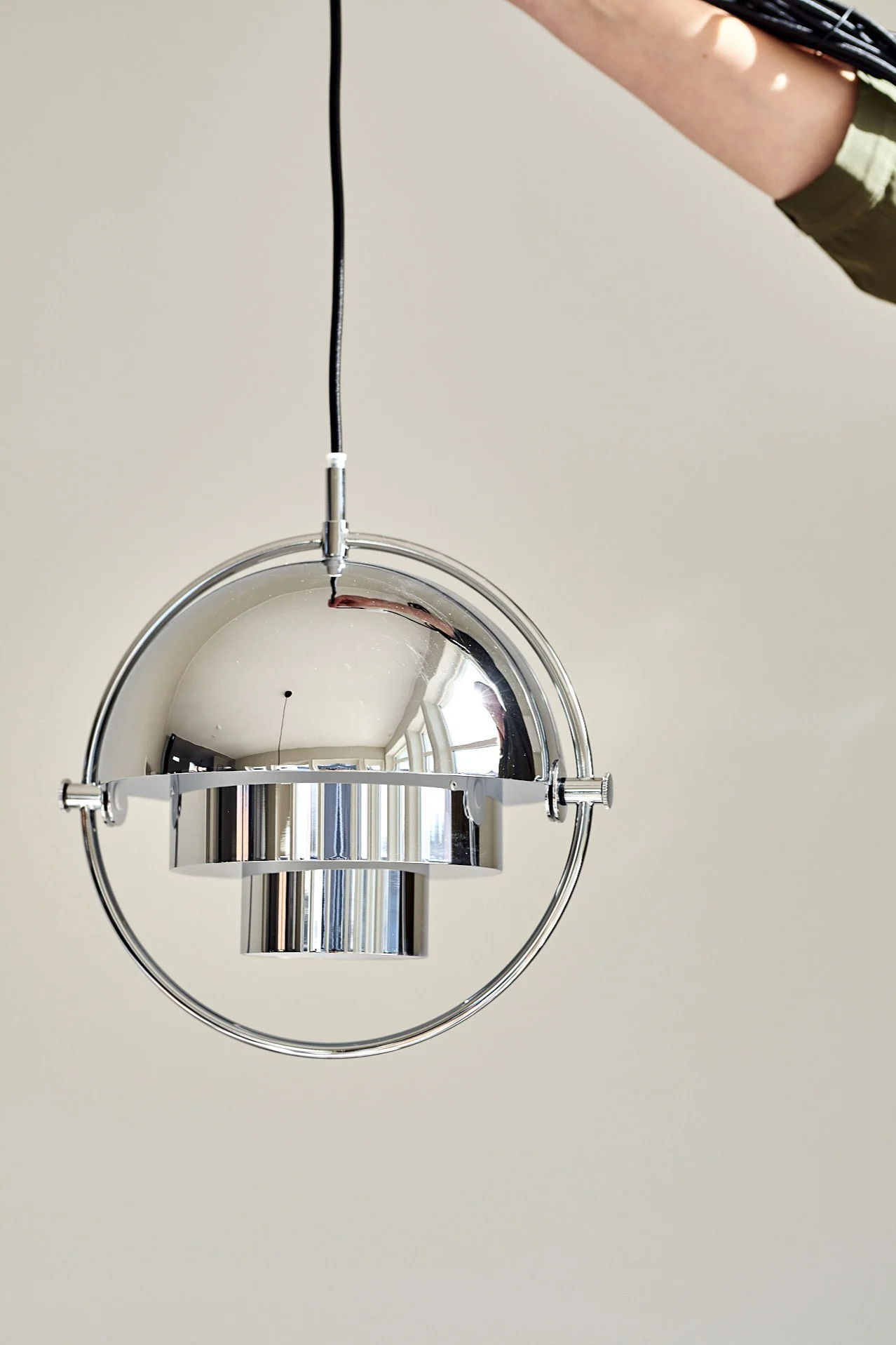 Multi-lite lamp from Gubi in chrome.