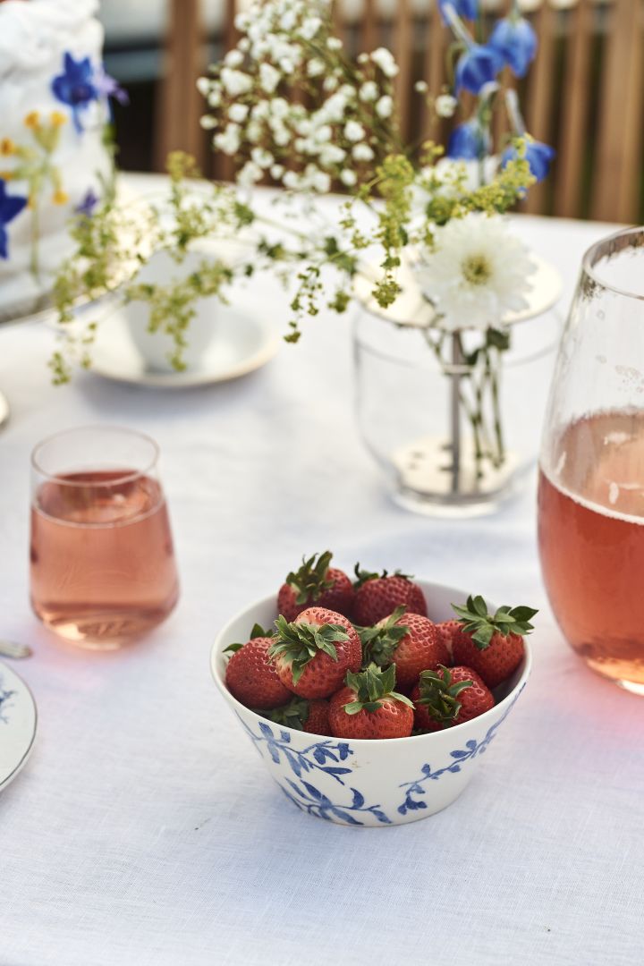 Strawberries are a classic addition to the table for a Swedish Midsummer party. Seen here in the Havspil bowl from Scandi Living.