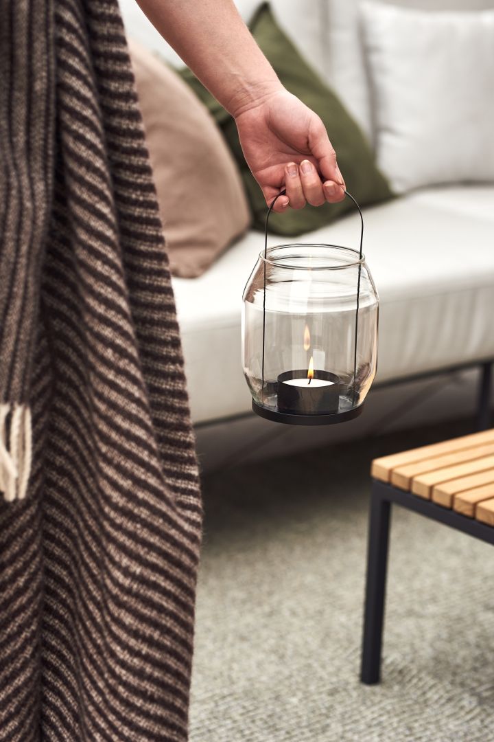 Decorate your balcony with cosy candles and lanterns like this one in black from Ernst.