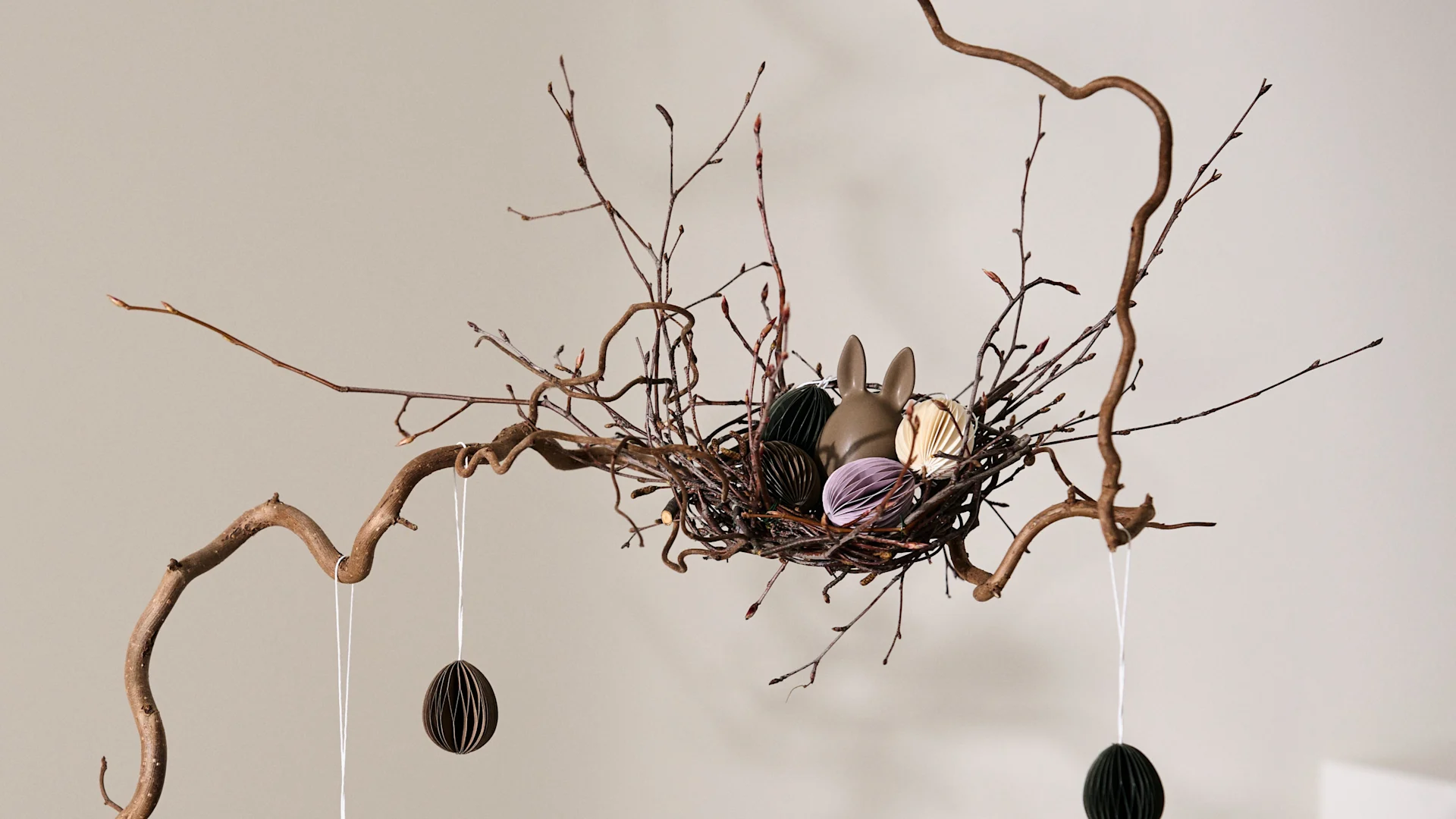 Make a bird's nest out of twigs and wire for Easter. Place it in your Easter tree or put it on the table as a decoration.