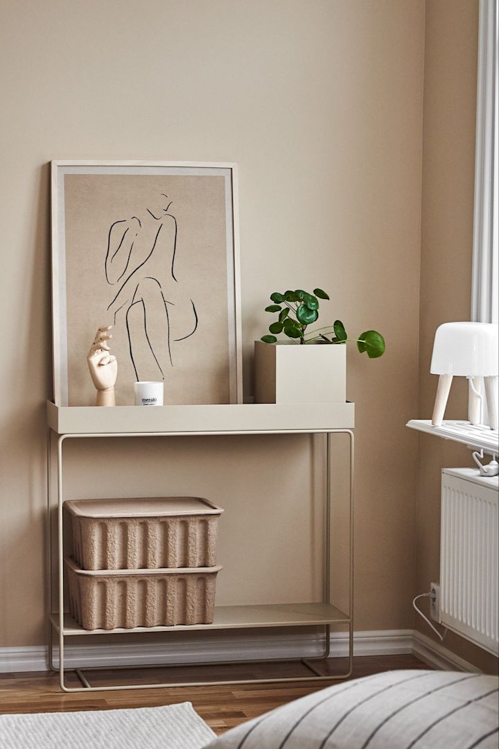 Beige living room with Plant Box and paper boxes from danish design brand Ferm Living. 