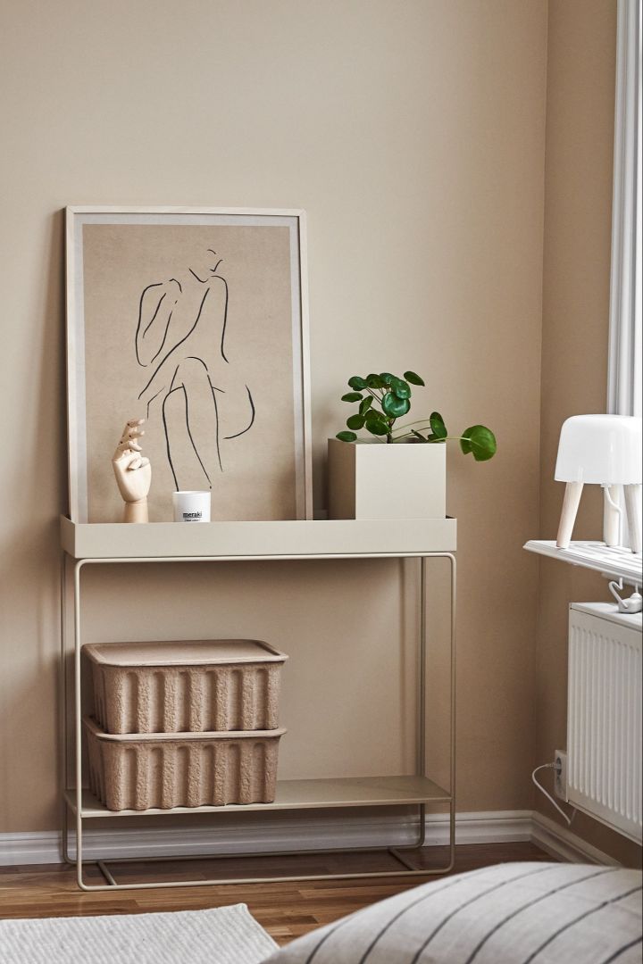 Beige living room with Plant Box and paper boxes from danish design brand Ferm Living. 