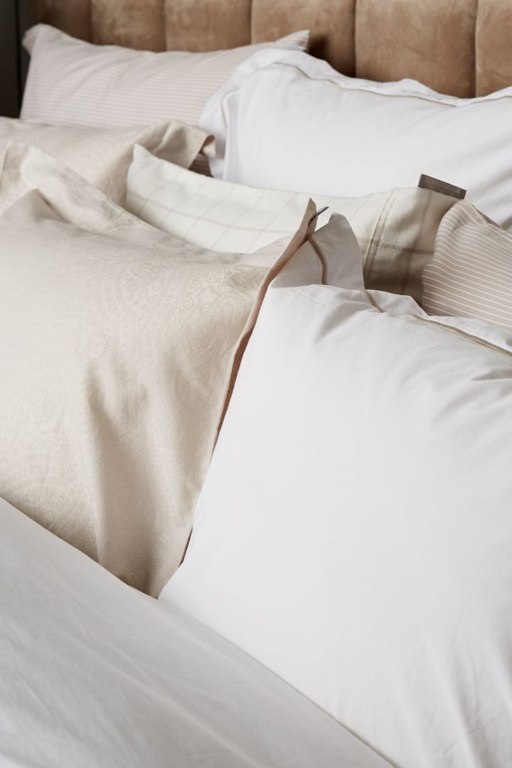 The create a hotel style bedroom you need luxury bedding - here you see white and cream from Lexingtons Hotel Collection.