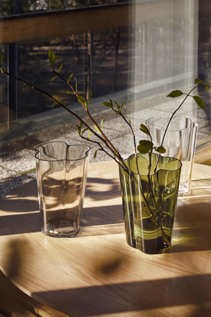 Decorating with nature's greenery is one of the interior design trends for spring 2022 that you can see in this lovely moss green Alvar Aalto vase from Iittala.