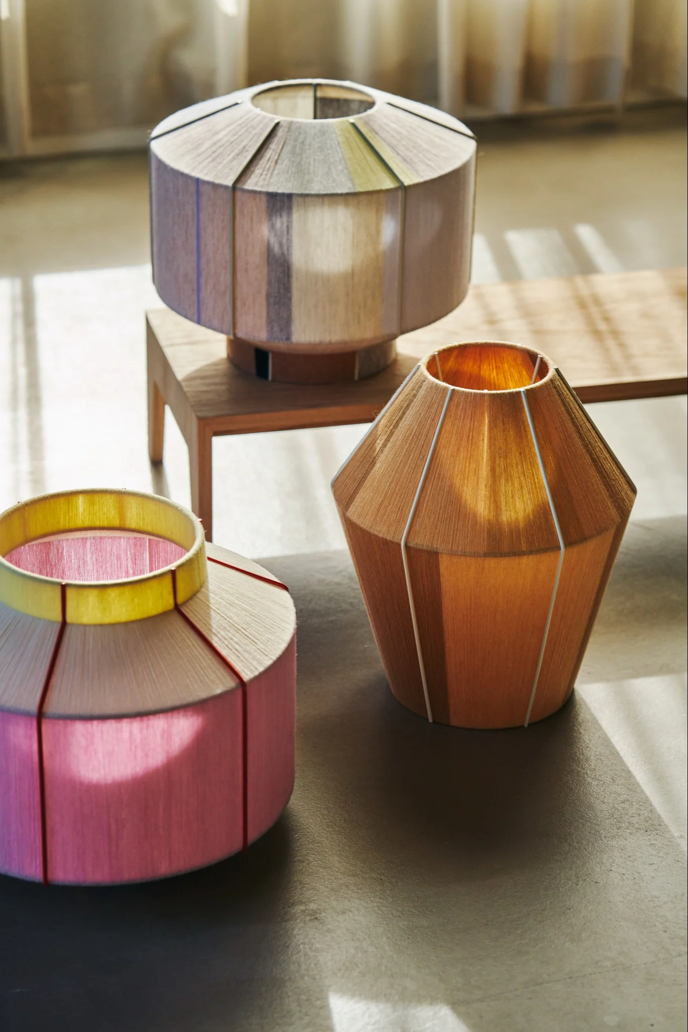 A collection of the Bonbon lampshades in all the shapes and colours from HAY.
