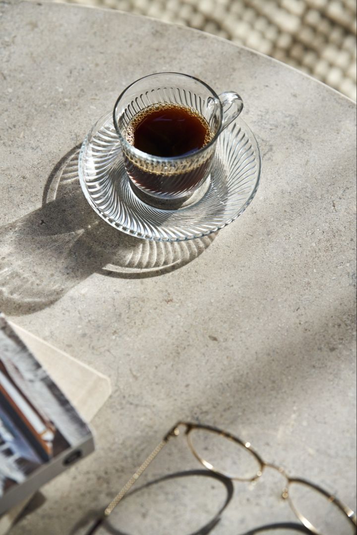 The Pirouette glass cup and saucer from HAY, the perfect design cup for your morning coffee. 