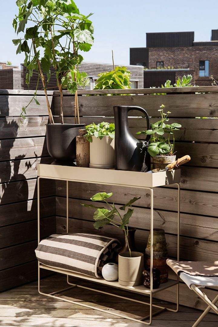Cosy patio decor ideas - Create a cosy patio by decorating it with stylish and practical Plant Box from ferm LIVING for your plants and pots.