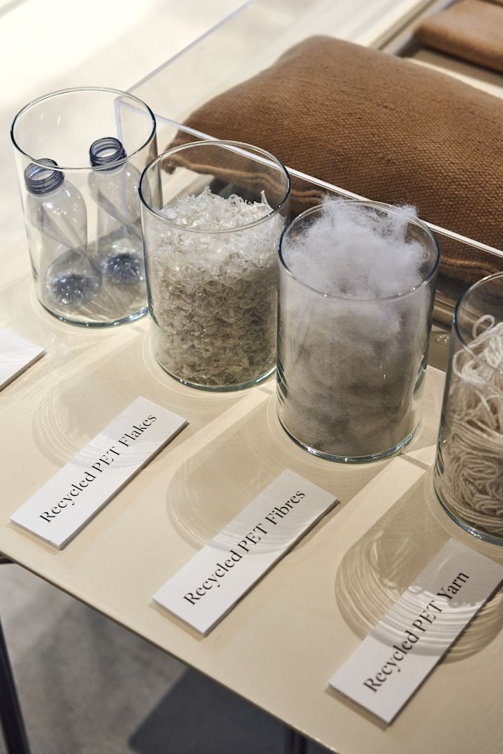 Glass jars that are filled with different kinds of recyclable materials in Ferm Livings showroom.