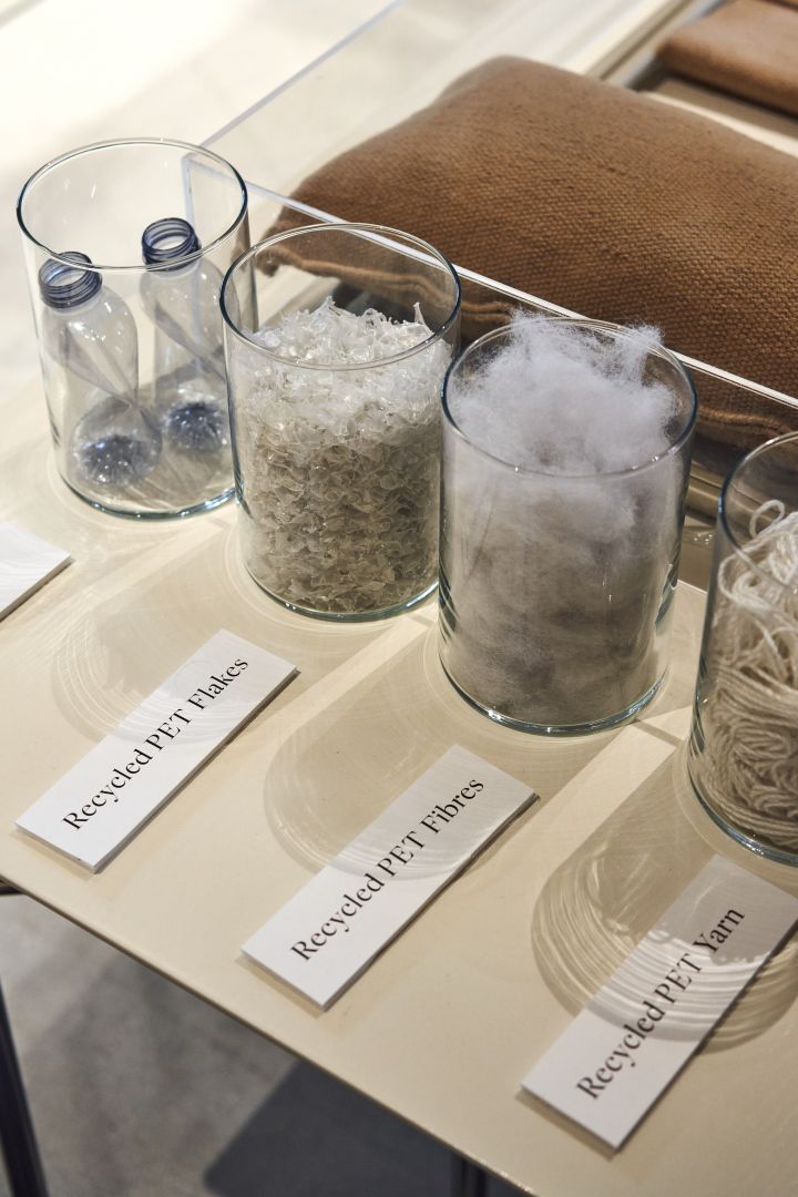 Glass jars that are filled with different kinds of recyclable materials in Ferm Livings showroom.
