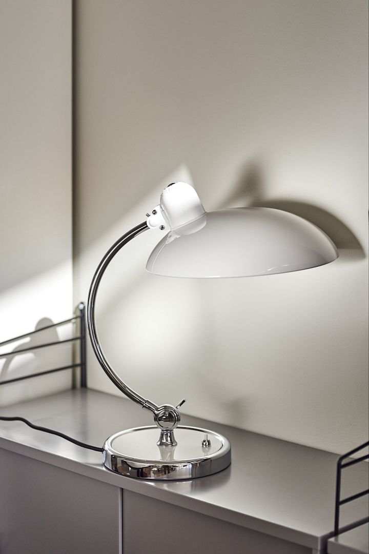 White table lamp from Fritz Hansen with chrome details. 