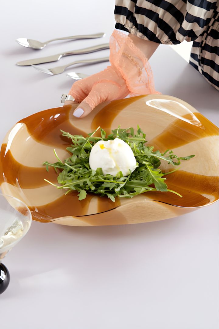 The glass bowl from Byon has a lovely retro feeling, one of the top Scandinavian interior design trends for 2023.