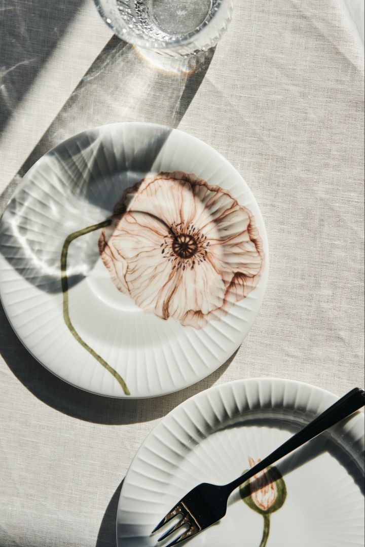 The Poppy side plate and saucer  from Hammershøi on a table setting in the sun. 