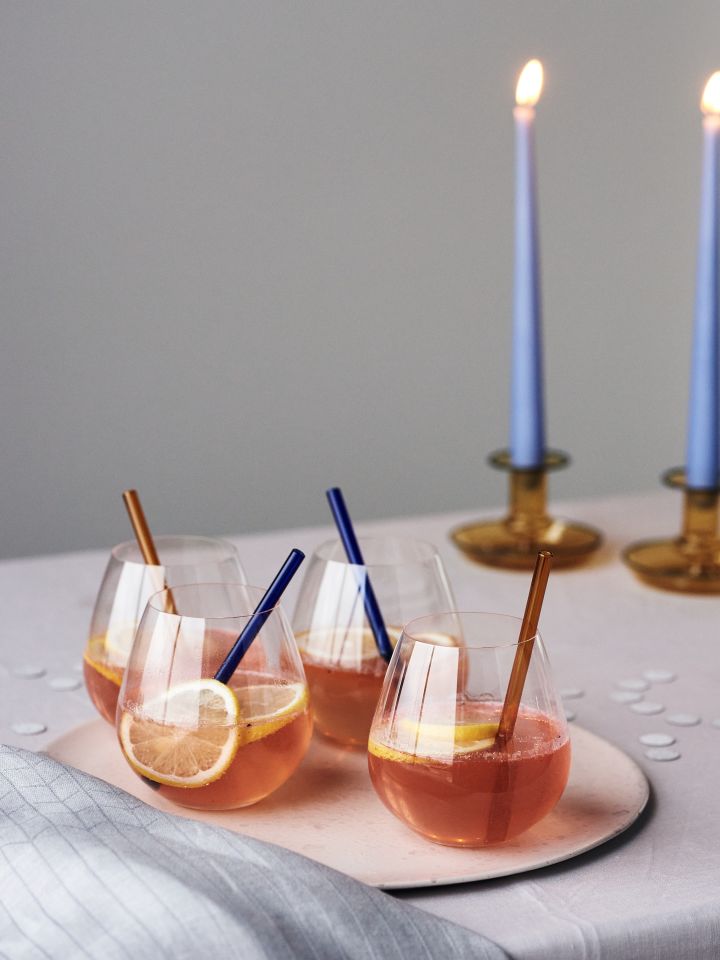 Colourful drinks with glass straws from By On. 