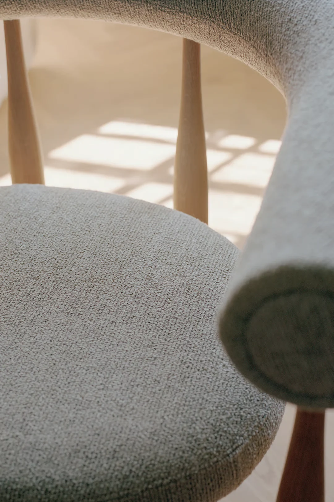 A close-up of a tubular chair showcasing the interior design trends of 2026.