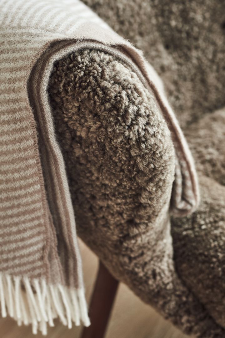 Tactile materials such as wool and sheep skin are one of the biggest interior design trends in Scandinavia in 2023. 