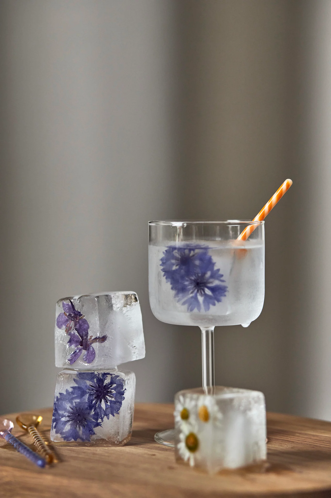 Freeze flowers or fruit in ice cube moulds and use them to decorate your mocktail.