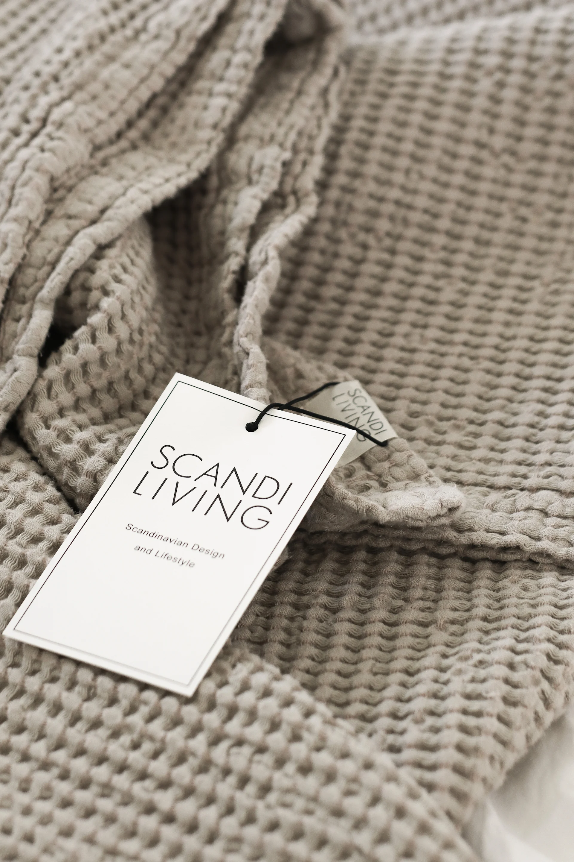 A close up of the Moss throw from Scandi Living, the perfect anniversary gift idea for couples who are celebrating their second anniversary.