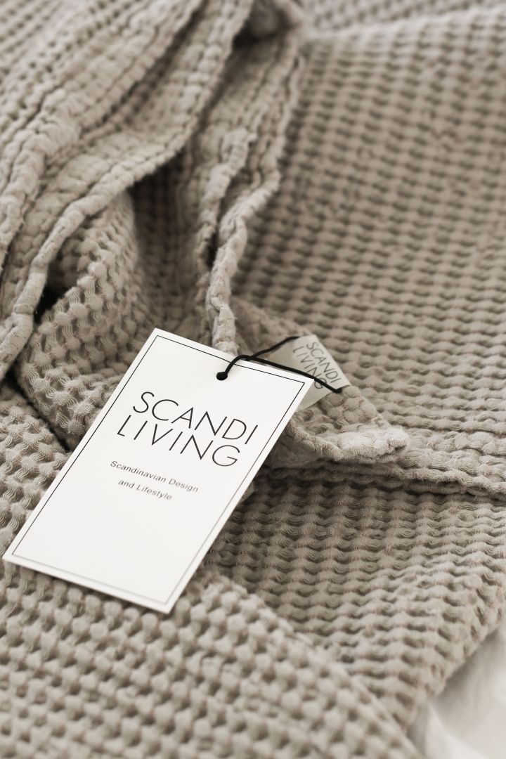 A close up of the Moss throw from Scandi Living, the perfect anniversary gift idea for couples who are celebrating their second anniversary. 