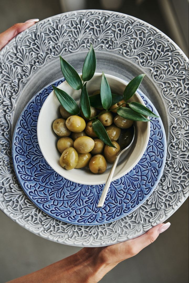 Grey and blue plates from the Lace series by Mateus, that evoke thoughts of the Mediterranean.  