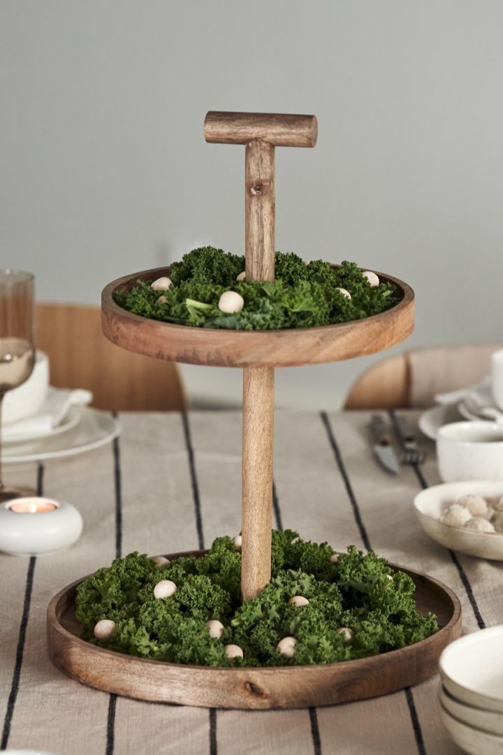 In natural mango wood the Bloomingville cake dish is the perfect addition to the Nurture Christmas tablescape. 