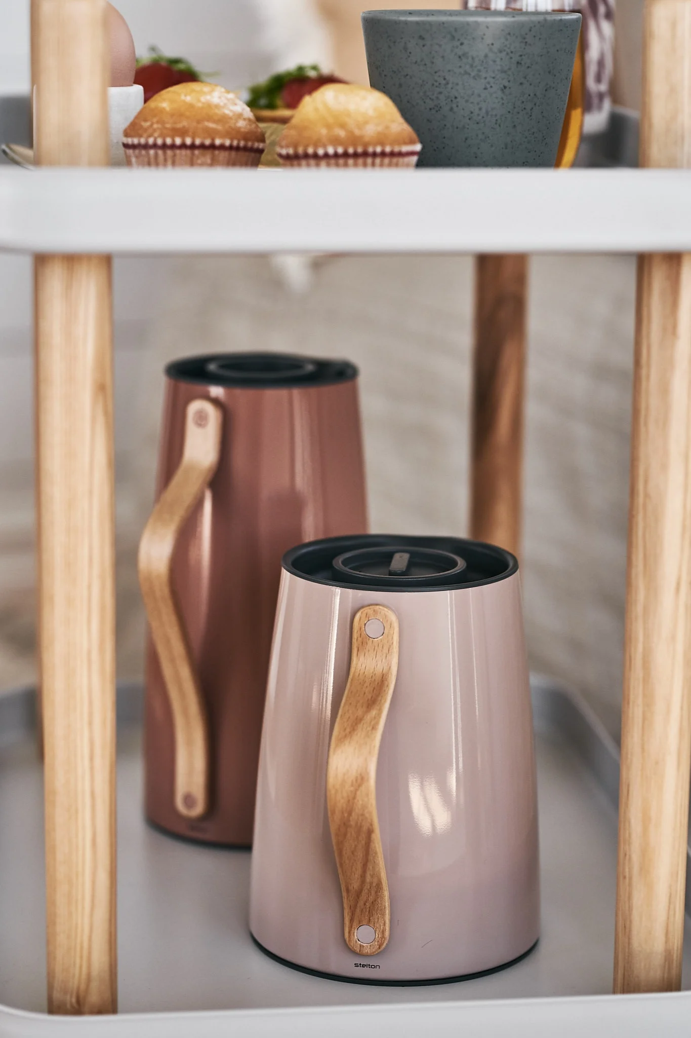 Emma thermos jug from Stelton - one for the coffee lover and one for the tea lover stand on the side table for a cosy moment with a luxury breakfast in bed
