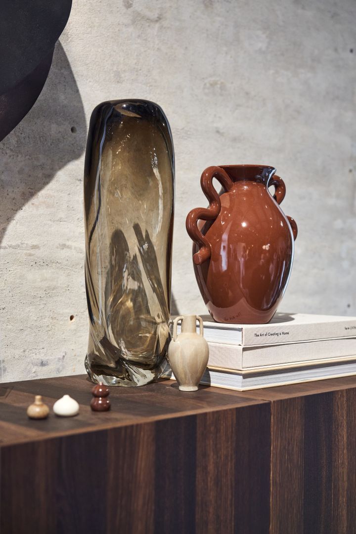 Vases in abstract and wavy shapes are making an appearance in the list of interior design trends for autumn 2022. Seen here are the Ferm Living Water Swirl and Verso vases. 