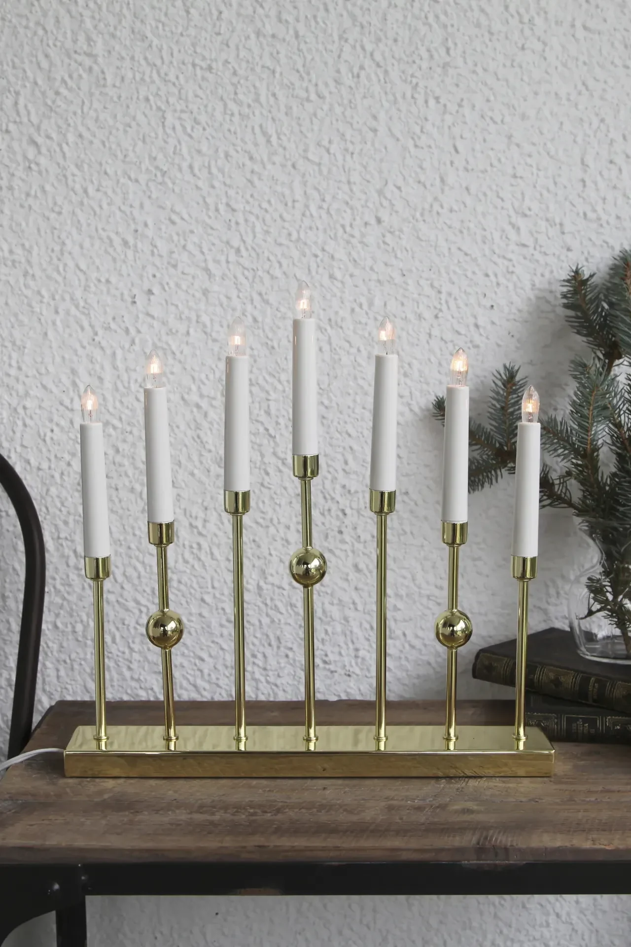 Here you see the Gustavo Advent candleholder in brass from Star Trading.