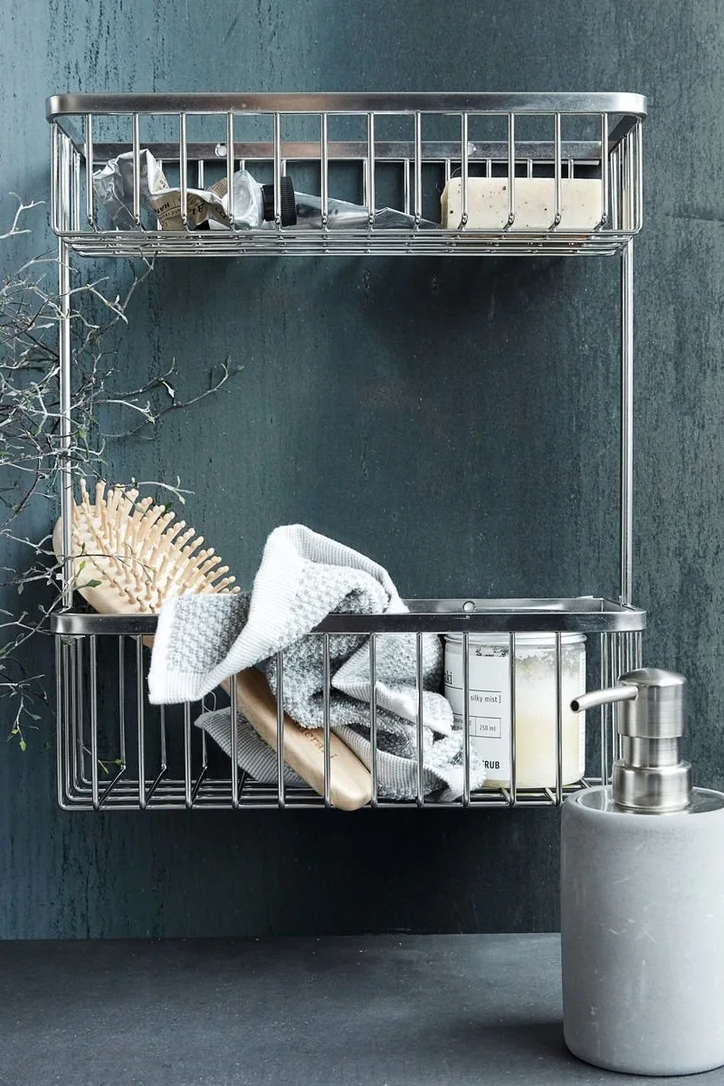 Storage ideas for small bathrooms - here you see the House Doctor shower shelf, perfect for storing all of your shower gels and shampoos. 