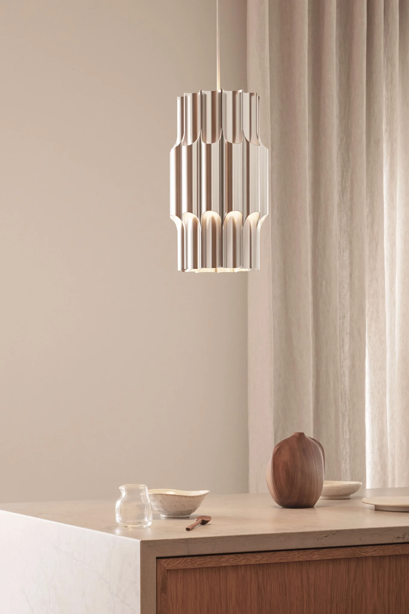 Decorate with metals in interior design 2025, here the stylish lamp Pan from Lyfa in aluminium. 