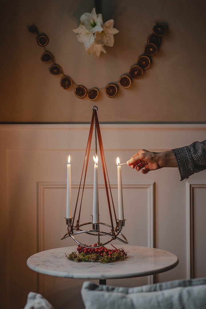 How to decorate with traditional Scandinavian Christmas decorations - The Season candle holder from Georg Jensen is a stylish and modern addition to the christmas table. 