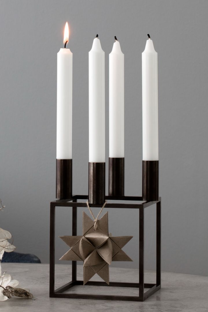 How to decorate with traditional Scandinavian Christmas decorations - The Kubus 4 candle holder from By Lassen is a stylish and modern addition to the christmas table. 